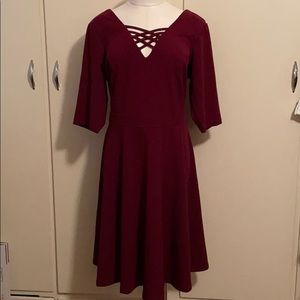 Red v-lined knee length dress